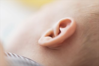 Close up of baby boy's(2-5 months) ear.