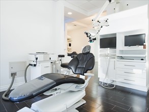 Empty dentist's office with modern equipment.