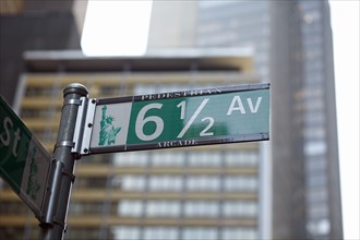 Low angle view of street name sign .
Photo :  Winslow Productions