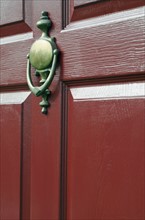 View of door knocker.
Photo : Tetra Images
