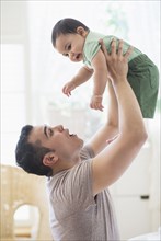 Father playing with his son (6-11 months).