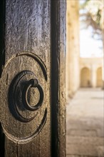 Door knocker on Cathedral of Almeria. Almeria, Spain.