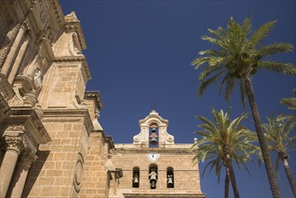 Palm trees in front of Cathedral of Almeria. Almeria, Spain.