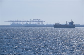 Cargo containers in sun. Mediterranean.