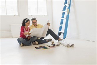 Couple preparing for renovation of new home.