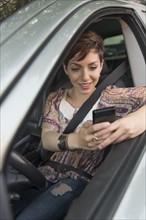 Female driver text messaging.