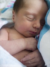 Newborn girl sleeping