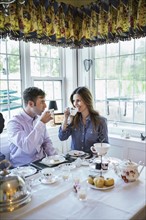 Couple eating together in dining room