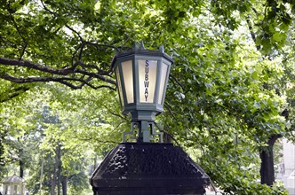 Lantern with subway sign