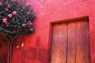 Red wall and doors of Monastery Santa Catalina