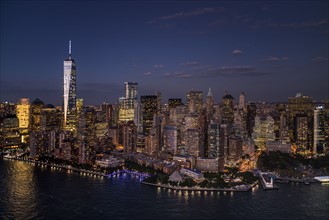 Aerial view of city with Freedom tower at night. New York City, New York.