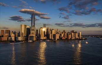 Aerial view of city with Freedom tower at sunset. New York City, New York.
