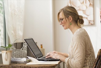 Woman working with laptop.