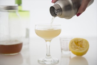 Woman pouring cocktail