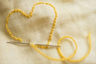 Stitched yellow heart
