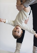 Girl (12-17 months) playing with her mom