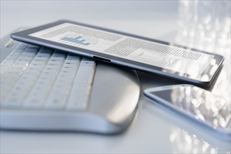 Computer keyboard, smart phone and digital tablet