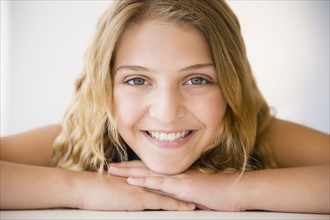 Portrait of smiling girl (12-13)