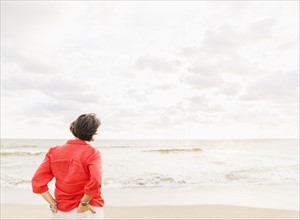 Rear view of woman looking at ocean