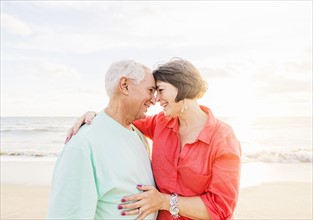Older couple spending time together on beach