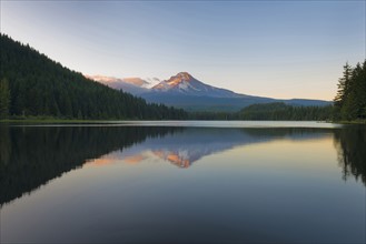 Reflection in still mountain lake