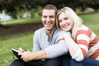 Portrait of young couple in park