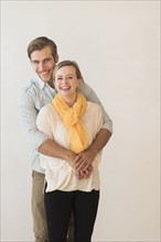 Portrait of smiling young couple.