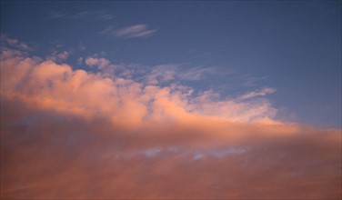 Sky with clouds at sunrise.