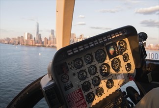 Cockpit in helicopter and Manhattan skyline