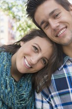 Portrait of young couple outdoors