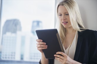 Businesswoman with digital tablet