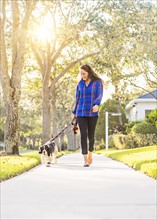 Woman walking her dog