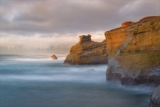 Scenic view of cliffs along coastline