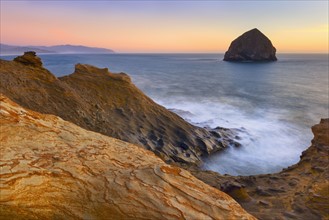 Scenic view of rock formations along coastline