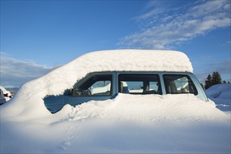 View of snowcapped car