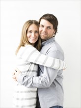 Mid-adult couple embracing