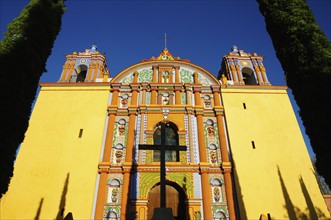 Low angle view of yellow ornate church
