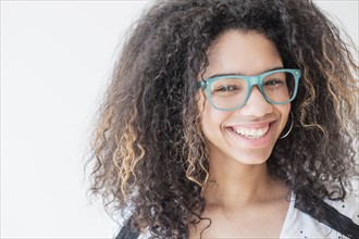Portrait of teenage girl (16-17) wearing eyeglasses.