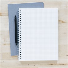 Overhead view of pen on notebook