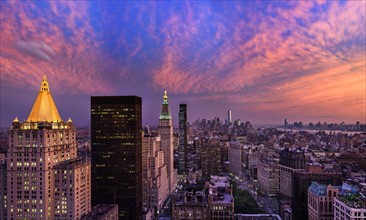 Cityscape at sunset. USA, New York, New York City.