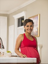 Portrait of pregnant woman smiling