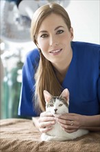 Portrait of vet with cat