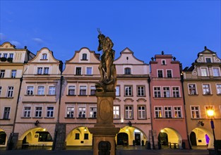 Statues and facades of old town houses
