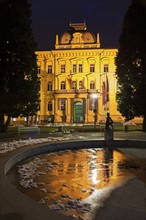 Illuminated facade of Maribor University building