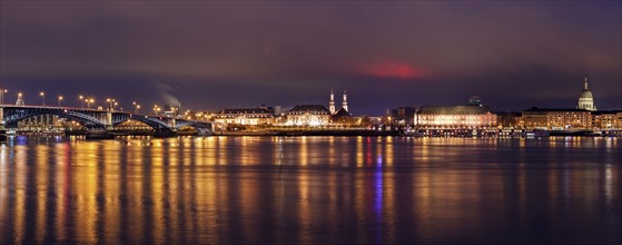 Illuminated waterfront skyline