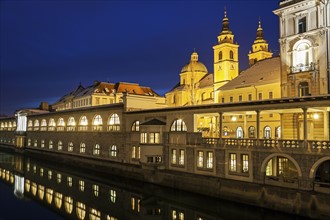 Illuminated waterfront with Saint Nicholas Cathedral