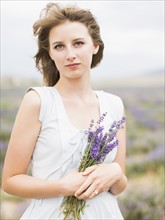 Portrait of bride with bunch of lavender