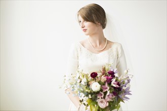 Portrait of bride with wedding bouquet