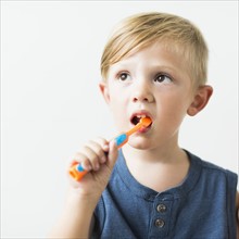 Little boy (2-3) brushing teeth