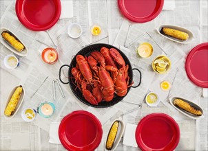Plate with lobsters on dining table